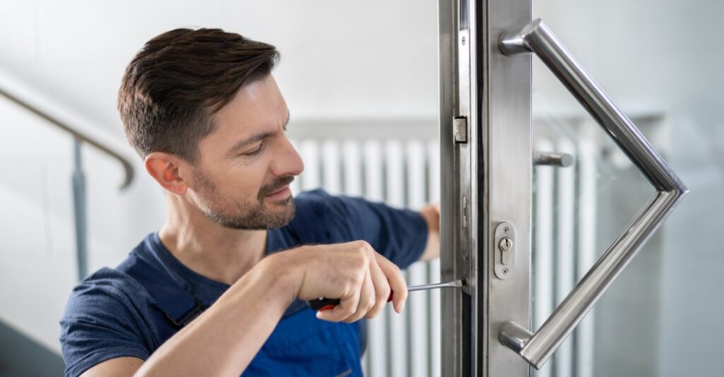 Locksmith Fontana Commercial Services man opening door